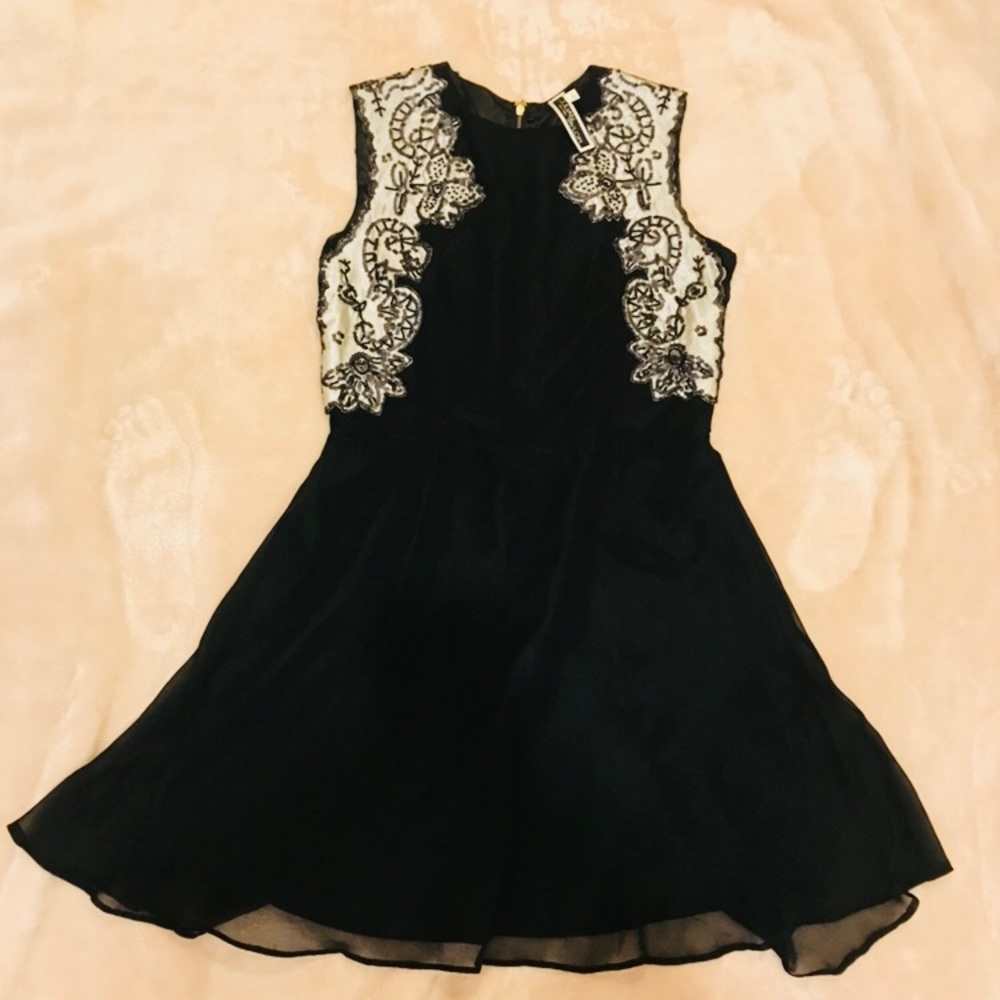 Cocktail black dress - size 8.